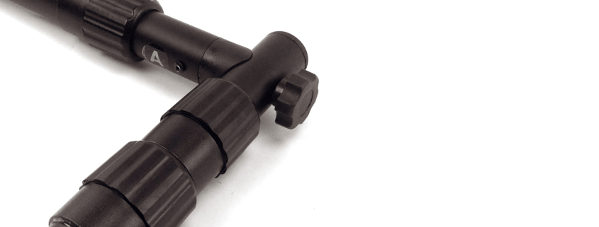 Close-up of black tripod leg hinge
