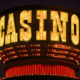 Illuminated casino marquee sign with bulbs
