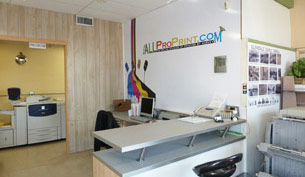 Print shop reception area with printers