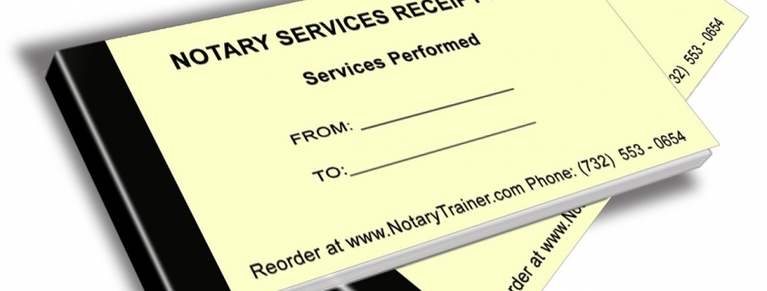 Stacked yellow notary receipt books