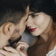 Close-up of affectionate couple, woman smiling