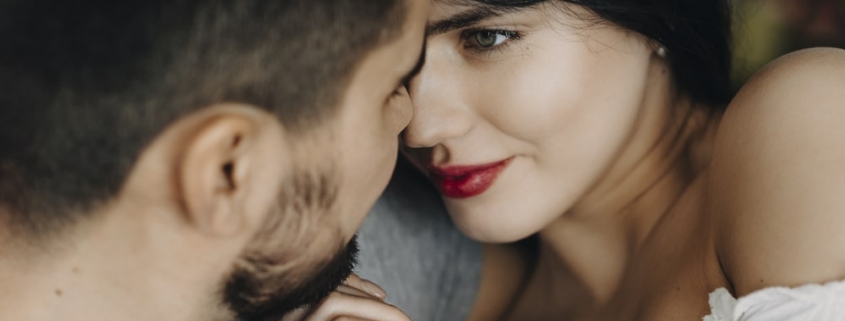 Intimate close-up of romantic couple embracing