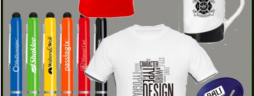Assorted branded promotional items: shirts, pens, mug, cap