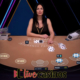 Live casino dealer at blackjack table
