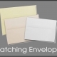 Three matching envelopes in cream, yellow, white