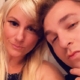 Close-up selfie of blonde woman and man
