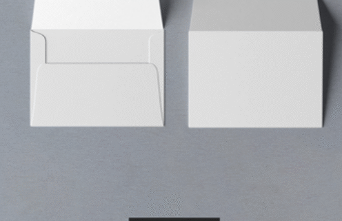 A-7 announcement envelopes on gray background