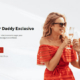 Smiling couple toasting near dating site banner