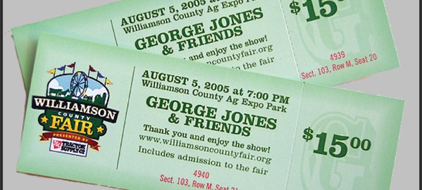 Two green concert tickets for county fair