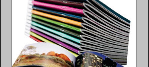 Colorful stacked glossy photo magazines