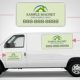 White van with green magnetic business signs