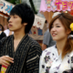 Young couple wearing yukata at summer festival