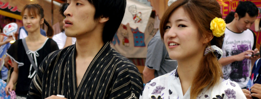 Young couple wearing yukata at summer festival