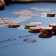 Poker chips and playing cards on casino table
