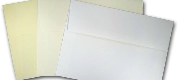 Three blank envelopes in cream and white