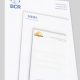 Stack of corporate letterhead sheets with logos