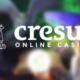 Cresus Online Casino logo on blurred background
