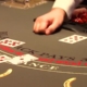 Blackjack table with dealer hand and chips