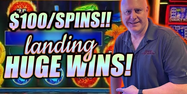Smiling man pointing at huge slot win