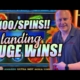 Smiling man pointing at huge slot win