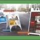 Three A-frame sidewalk advertising signs