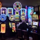 People at brightly lit casino slot machines