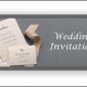 Elegant wedding invitations with ribbon and envelopes